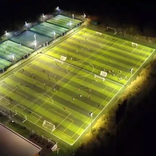 LED floodlights over 5-a-side pitches at a Goals Soccer centre at night