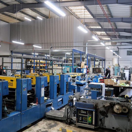 LED battens over the print floor at Tate Business Group